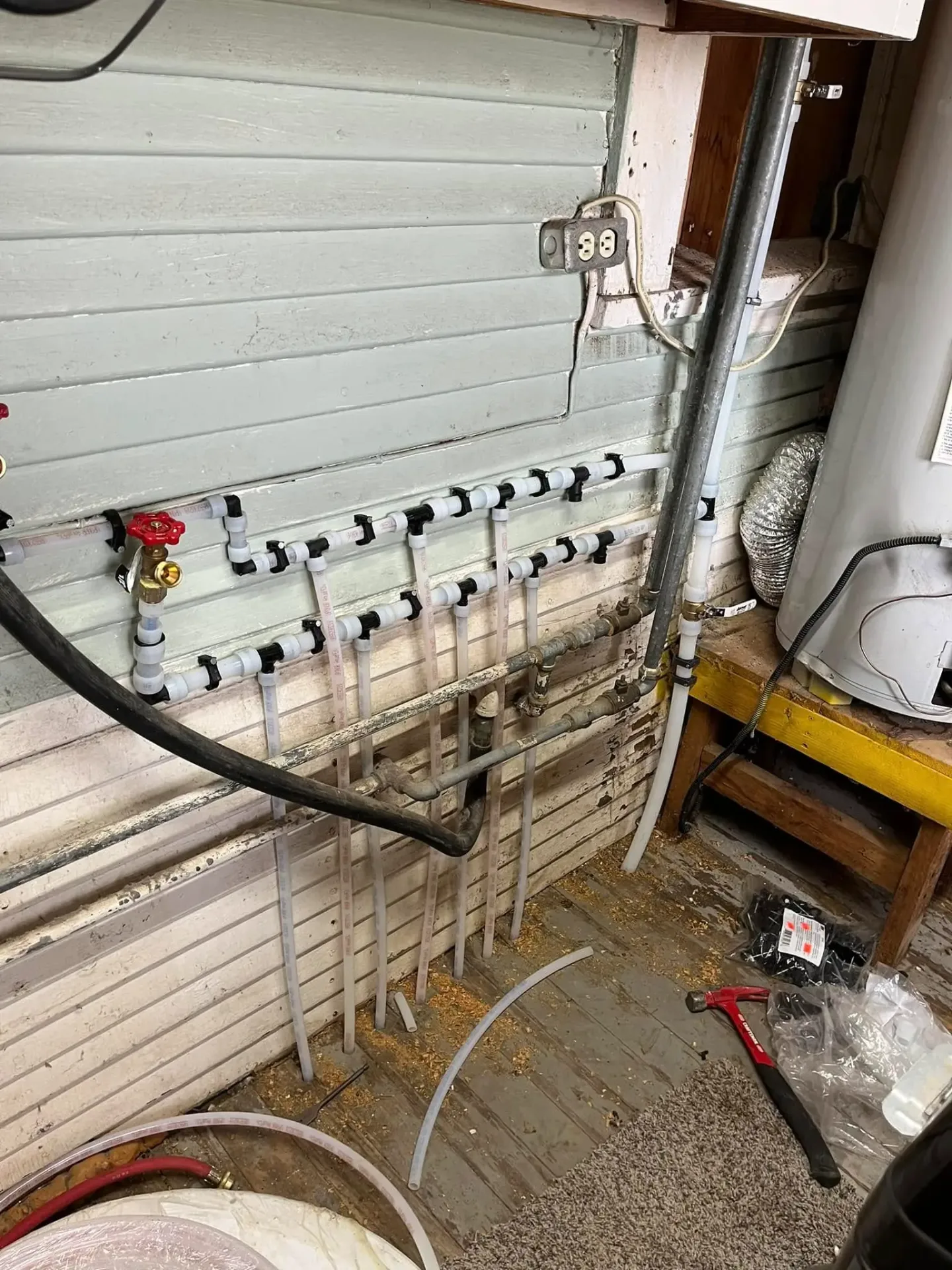 PEX manifold installation for water heater system in Perkins OK